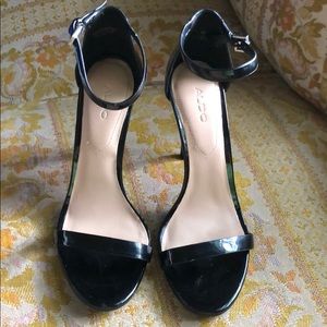 A black dress high heel shoes